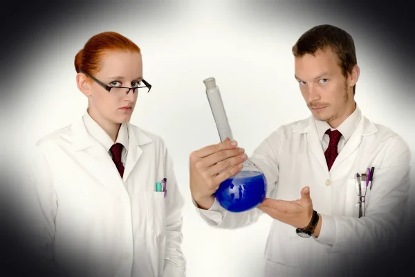 man, woman, coat, people, laboratory, lab, glass, liquid, blue, test, doctor, chemist, chemical, face, hospital, laborat