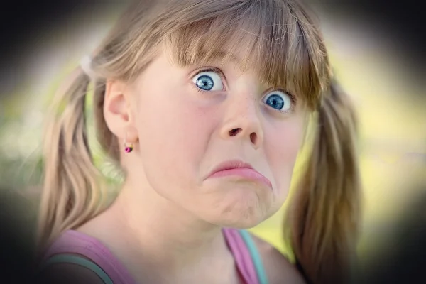 person, human, child, girl, blond, grimace, silly, nonsense, fooling around, pull faces, portrait, close up, grimace, si