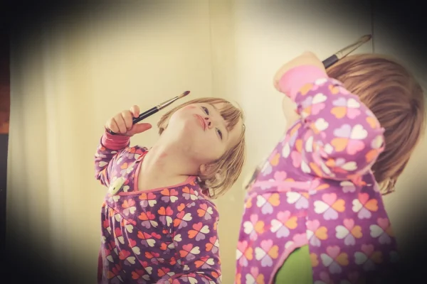 girl, down syndrom, make up, child, mirrors, blonde, little girl, happy, hearing implant, curious, to play, smile, playf