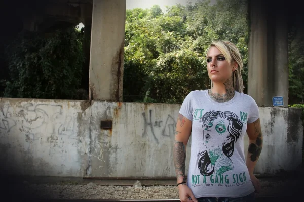 bridge, dreads, dreadlocks, blonde, sugarskull, sugar skull, female, white, city, graffiti, tunnel, shirt, tattoo, rock,