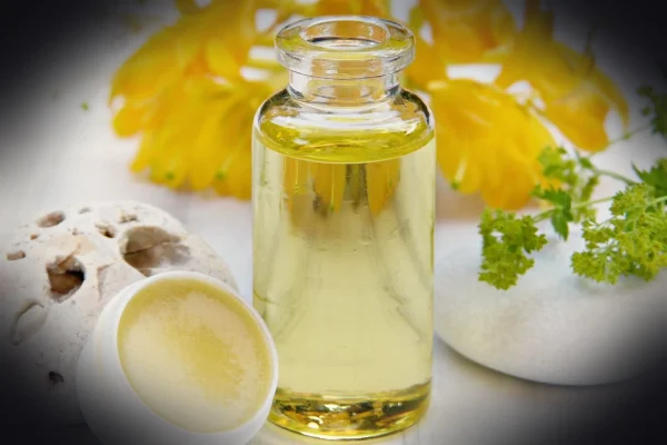 oil, lip balm, beeswax, blossoms, bottle, glass, honey, pollen, yellow, cosmetics, natural cosmetics, personal hygiene,