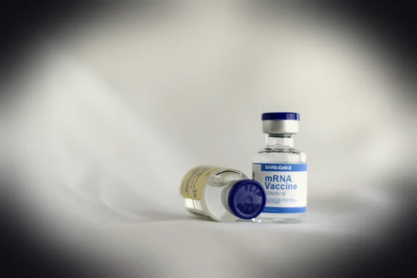 white and blue labeled bottle