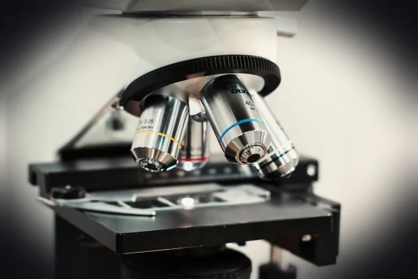 a close up of a microscope on a table