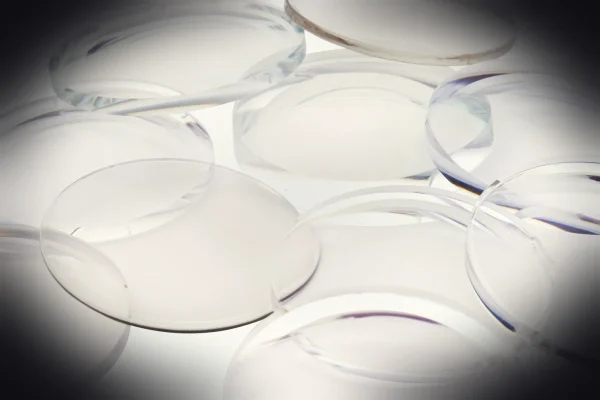 clear glass round ornament on white surface