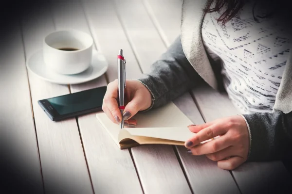 woman, write, notepad, girl, female, hand, note, business, notebook, desk, work, working, table, pen, student, young, wr