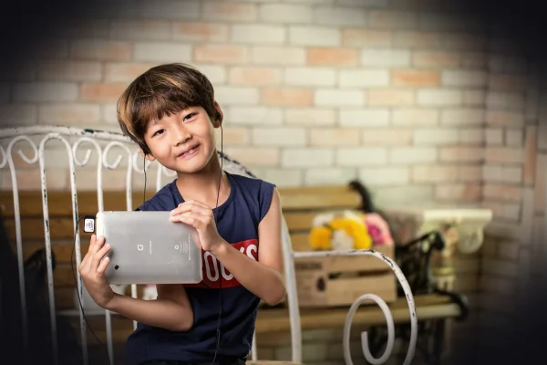 korean, child, device, tablet, headphones, earbuds, earphone, music, listening, modern technologies, education, brown ed