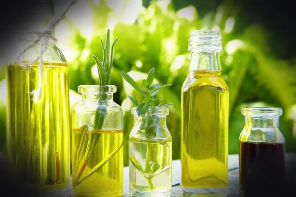 glass, bottles, oil, natural oils, almonds, herbs, herbal oils, cosmetics, essential oils, aromatherapy, thyme, rosemary