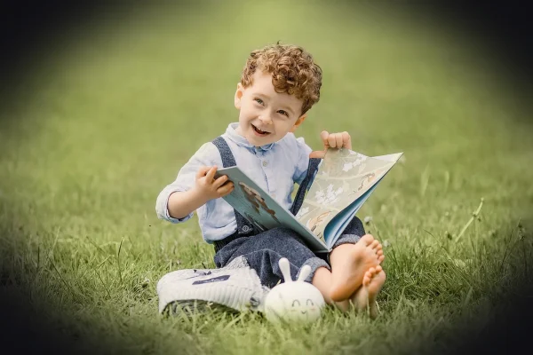 person, child, book, sitting, grass, education, nature, park, summer, reading, happiness, childhood, green, leisure, lif