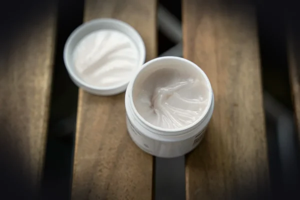 white plastic cup with white cream