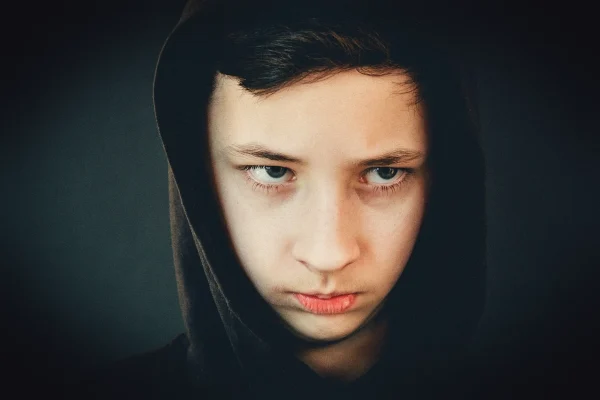 boy, teen, evil, angry, disgruntled, look from under the forehead, difficult teen, hood, pose, posing, model, fashion, s