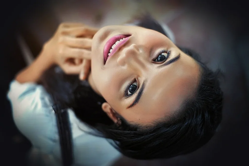 face, girl, close up, looking up, upside down, makeup, cosmetics, look up, smiling, happy, smiling woman, young woman, smile,
