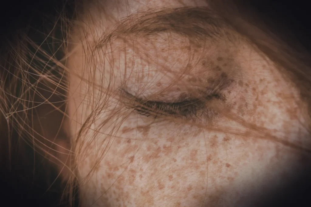 closed eyed woman