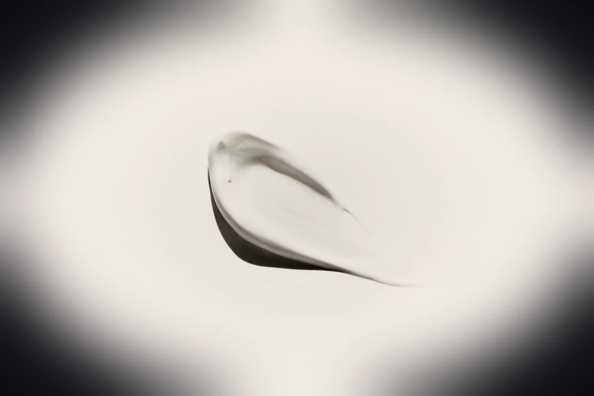 stainless steel spoon on white surface