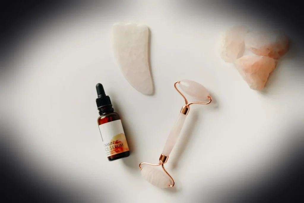 white and black plastic bottle beside white heart shaped ornament